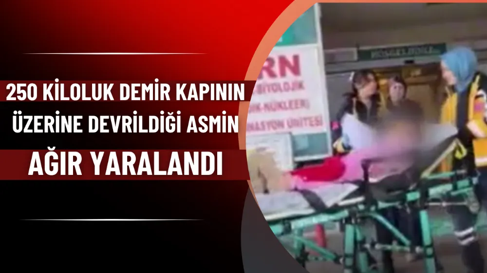 250 kiloluk demir kapının üzerine devrildiği Asmin ağır yaralandı