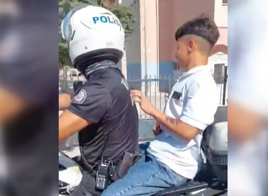 Kimliğini evde unutan öğrenciyi motosikletli trafik polisi sınava yetiştirdi